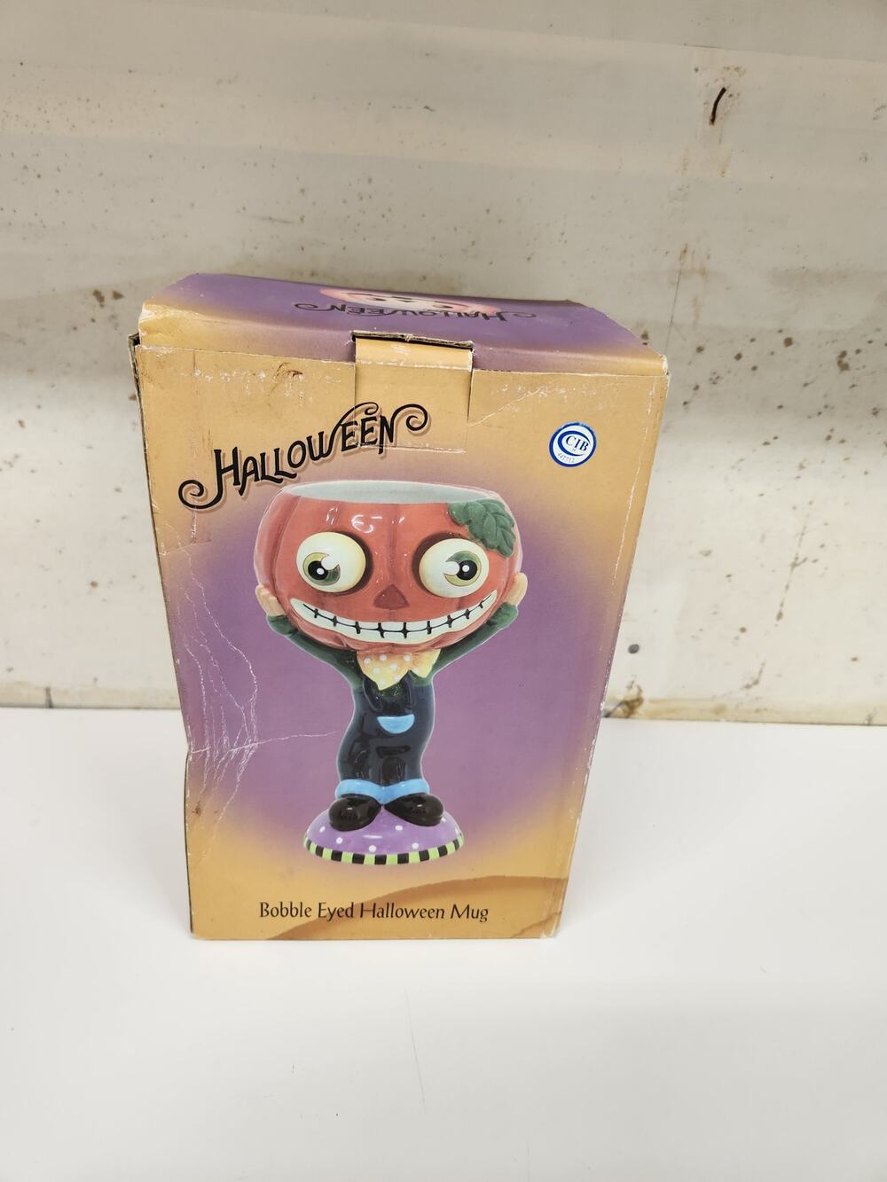 Vintage Halloween Ceramic decoration jack-o'-lantern man with wiggle eyes NIB